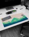 Modern 32x16 inches mouse pad featuring green mountains, minimalist layers, and soft peach skies for a calm, smooth workspace aesthetic.