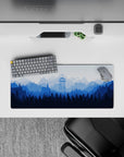 28x12 inches mouse pad with misty blue mountain landscape and watchtower, providing a calm, peaceful design perfect for both work and gaming.