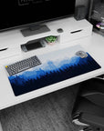 Modern 32x16 inches mouse pad featuring misty blue mountain landscape with a watchtower, adding natural beauty and tranquility to your desk.