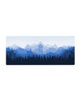 Mouse pad featuring misty blue mountain landscape, 28x12 inches, with a watchtower for a serene, natural design that enhances your workspace.