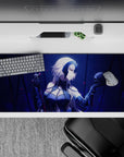 Striking 36x16 desk pad highlights Jeanne d'Arc Alter's haunting presence and fierce demeanor in vivid detail