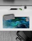 28x12 inches mouse pad with oceanic abstract design, capturing swirling blue and green hues for a calming and dynamic workspace vibe.