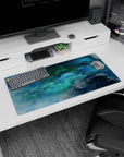 Modern 32x16 inches mouse pad featuring oceanic abstract design, with blue and green swirling hues for a peaceful and dynamic workspace.