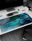 Large 40x20 inches desk pad featuring oceanic abstract design, capturing swirling blue and green hues for a dynamic, peaceful atmosphere.