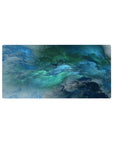 Mouse pad featuring oceanic abstract design, 32x16 inches, with swirling blue and green hues for a dynamic and calming workspace vibe.