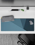 Intense 32x12 mousepad features layered blues and sharp shapes with intricate details for fans of minimalism