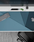 Sleek 40x20 mousepad showcases layered geometric patterns with serene blue hues for a productive workspace vibe