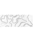 Compact 32x12 inches mouse pad with black and white contour design, blending bold lines with clean white space for a sleek and functional setup.