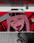 Intense 40x20 desk pad with Nayuta's glowing eyes, razor-sharp fangs, and a crimson battlefield, perfect for fans of villainous anime aesthetics