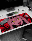 Chaotic energy 40x20 anime desk mat featuring Nayuta, the Control Devil, with glowing eyes and razor-sharp fangs in a bold crimson battlefield