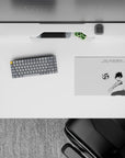 Black-and-white anime mouse pad 14x10 inches with sharp minimal ink art, airy calm desk vibe.