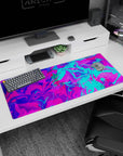 Vibrant 36x16 anime desk mat with bright neon tones in pink, electric blue, and purple for an exciting, creative design