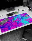 Vivid 40x20 anime desk mat with neon pink, electric blue, and purple swirls, perfect for adding bold energy and creativity to your setup