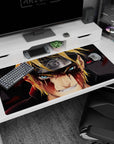 Naruto Uzumaki facing forward with Sasuke behind, Sharingan glare on 40x20 inches anime desk pad.