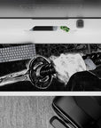 Striking 36x16 mouse pad highlights the warrior’s grip, gleaming blade, and stark contrasts in stunning artistic detail