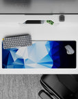 Refreshing 32x12 mouse pad with icy blue tones, faceted geometric shapes, and deep blue gradients for a sleek, modern look