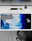 Sleek 32x16 mouse pad with icy blue tones and faceted geometric shapes for a refreshing, crystalline workspace design