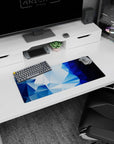 Sleek 28x12 mouse pad with faceted geometric shapes and deep blue gradients for a refreshing, icy blue aesthetic