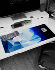 Refreshing 36x16 anime desk mat with deep blue gradients and icy blue geometric shapes for a cool, crystalline aesthetic