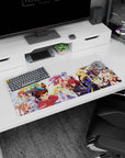 Anime mouse pad 32x16 inches showing determined heroes across the desk, blades raised, with playful side characters.