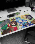 KonoSuba anime mouse pad 40x20 inches featuring Megumin, Aqua, Kazuma, and Darkness relaxing in a serene grassy setting.