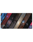 Galaxy collage mouse pad with bold diagonal panels and star-speckled space design, 32x16 inches.