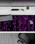 Striking 36x16 mousepad highlights vibrant pink tones against a dark backdrop with intricate digital details in stunning contrast