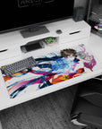 Anime couple desk pad 36x16 inches showing a boy catching a pink-haired girl amid swirling blue energy.