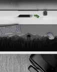 36x16 inches mouse pad featuring a monochrome forest and watchtower design for a serene and minimalist workspace.