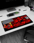 Modern 32x16 inches mouse pad featuring Chainsaw Man with bold cover illustration, manga panel chaos, and blood-red aesthetic.