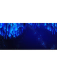 Desk pad featuring Neon Cascade design, 36x16 inches, with electric blue lines and glowing dots for a sleek and serene, modern workspace vibe.