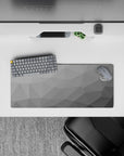28x12 inches mouse pad with monochrome geometric design, blending soft gray shades and triangular shapes for a subtle, modern effect.