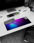 Star-speckled cosmic cloud scene mouse pad 28x12 inches, like a tiny universe on your desk.