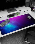 Nebula scene desk pad 40x20 inches featuring soft cloud swirls and starry speckles like a mini universe.