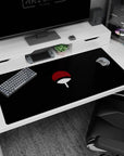 Sasuke Uchiha inspired desk pad 40x20 inches featuring the Uchiha fan emblem on black.