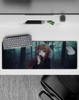 32x12 inches anime mouse pad in cool blue-gray mist, moody trees, and warm auburn hair accents.