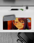 Anime girl mouse pad 28x12 inches in rich sunset oranges and deep violet hair shine, warm and cheeky mood.
