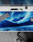 Cosmic 40x20 desk pad with icy mountains, distant planets, and a cosmic sky, creating a calm yet imaginative atmosphere for your desk