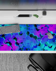36x16 inches mouse pad with glowing hexagonal patterns in blue, teal, and purple, creating depth and a dynamic, futuristic aesthetic.