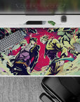 Dynamic 40x20 desk pad showcases the epic clash of Jotaro and Dio with vibrant colors and intense action