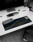 Sleek 32x12 mouse pad with dynamic teal, yellow, and red curves for an organized, tech-inspired design for a modern workspace