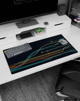 Futuristic 32x16 mouse pad with bold teal, yellow, and red lines, creating a dynamic, minimal design for a modern workspace