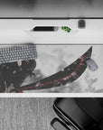 Striking 36x16 desk pad highlights Zoro's determination and blade mastery with vivid red details for impact