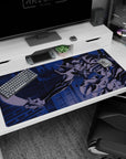 Large 40x20 inches mouse pad with Eva Unit-01 in a combat stance in Tokyo-3, glowing blue for a striking, retro-mechanical look.