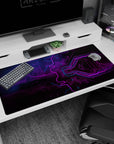 Large 40x20 inches mouse pad featuring neon tech design, with vibrant purple and blue circuitry flowing through the surface for electrifying energy.