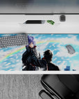 36x16 inches blue-and-white anime desk pad, sharp highlights and snowlike paper shards for dramatic mood.