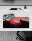Sunset landscape 28x12 mouse pad featuring a vibrant crimson sunset and scenic view, adding warmth and adventure to your desk