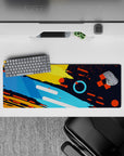 Intense 32x12 desk mat features vibrant strokes and geometric details for fans of structured creativity