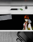 36x16 inches anime desk pad in warm amber highlights on black, calm intense vibe with clean negative space.