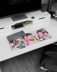28x12 inches anime girl mouse pad featuring glasses-wearing heroine with friends, caught mid-pose under pink petals.